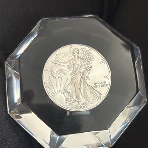 Silver Coin in Crystal Display